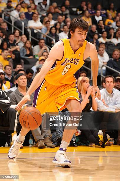 Adam Morrison of the Los Angeles Lakers dribbles during a game against the Indiana Pacers at Staples Center on March 2, 2010 in Los Angeles,...