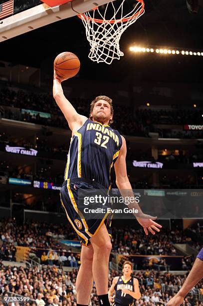 Josh McRoberts of the Indiana Pacers roses for a dunk during a game against the Los Angeles Lakers at Staples Center on March 2, 2010 in Los Angeles,...