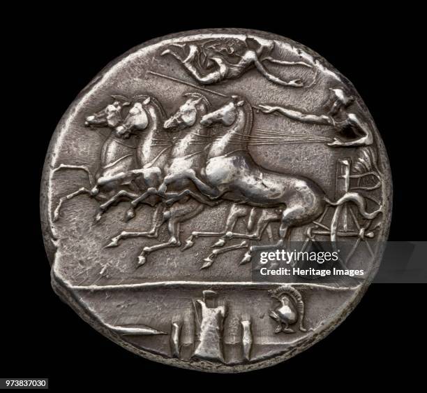Ancient Greek silver coin, 404 BC-390 BC. Dimension: diameter: 40 mmweight: 43.21 gdie-axis: 6 o'clockArtist Unknown.