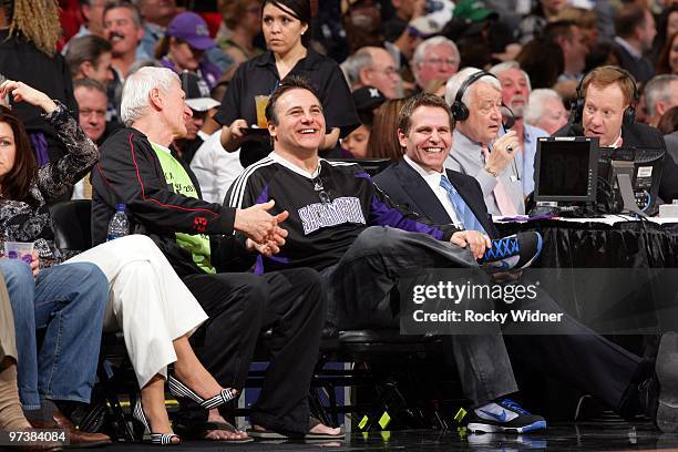 Sacramento Kings co-owners Gavin Maloof and Joe Maloof smile as they sit court side during the game against the Boston Celtics at Arco Arena on...