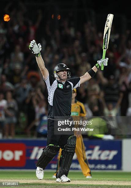 Scott Styris of New Zealand celebrates hitting the winning runs during the First One Day International match between New Zealand and Australia at...