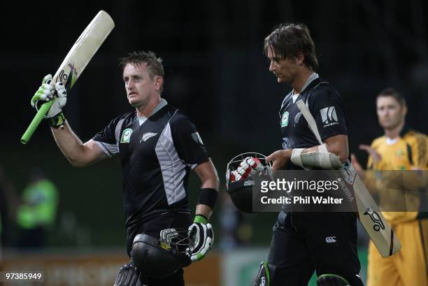 Scott Styris and Shane Bond of New Zealand leave the field following the First One Day International match between New Zealand and Australia at...