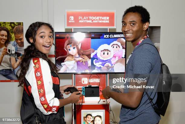 Chandler Kinney gets a look at the Super Smash Bros. Game on the Nintendo Switch system during the 2018 E3 Gaming Convention at Los Angeles...