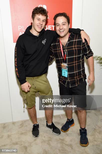 Nolan Gould and Sean Marquette visit the Nintendo booth during the 2018 E3 Gaming Convention at Los Angeles Convention Center on June 13, 2018 in Los...