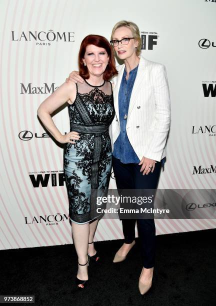 Kate Flannery and Jane Lynch attend the Women In Film 2018 Crystal + Lucy Awards presented by Max Mara, Lancôme and Lexus at The Beverly Hilton Hotel...