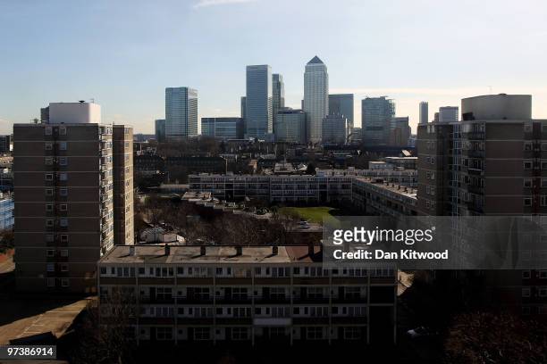 Canary Wharf rises above an area of council housing in Limehouse on March 02, 2010 in London, United Kingdom. As the UK gears up for one of the most...