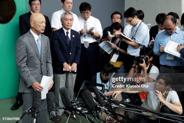 Shigakkan University wrestling team coach and former development director at Japan Wrestling Federation Kazuhito Sakae speaks to members of the media...