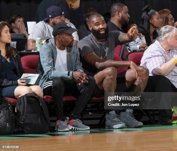 Kyle O'Quinn of the New York Knicks enjoys the game between the New York Liberty and against the Las Vegas Aces on June 13, 2018 at Westchester...