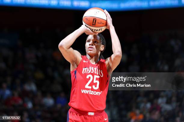 Monique Currie of the Washington Mystics shoots the ball against the Connecticut Sun during a WNBA game on June 13, 2018 at the Mohegan Sun Arena in...