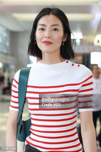Fashion model Liu Wen is seen at Shanghai Hongqiao International Airport on June 13, 2018 in Shanghai, China.