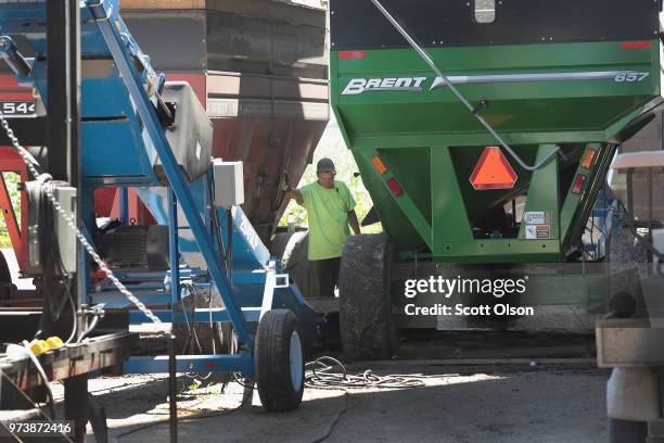 David Clark loads soybeans into a shipping container at a Ruff Bros. Grain elevator on June 13, 2018 in Blackstone, Illinois. U.S. Soybean futures...