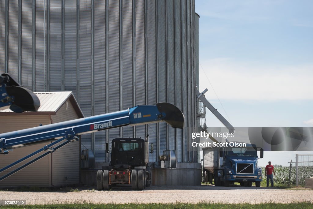 Bocker Ruff A worker loads soybeans onto a truck at a Ruff Bros. Grain elevator ...