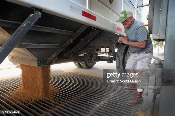 Farmer John Duffy unloads soybeans at a Ruff Bros. Grain elevator on June 13, 2018 in Blackstone, Illinois. U.S. Soybean futures plunged today with...