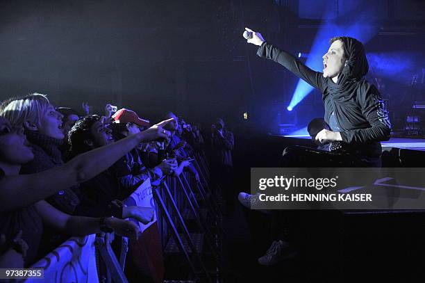 Irish singer Dolores O'Riordan of Irish rock band "The Cranberries" performs on stage in Cologne, western Germany on March 2, 2010. This was the...
