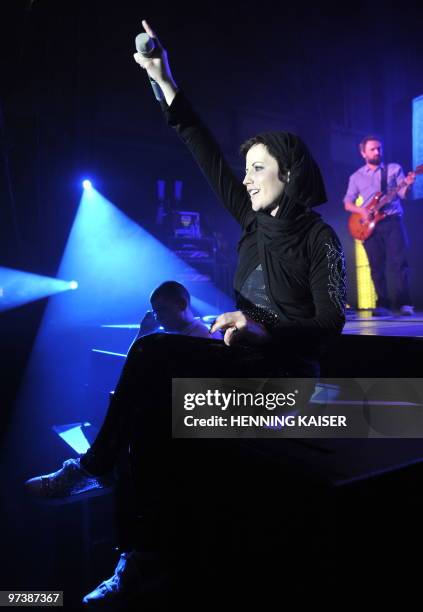 Irish singer Dolores O'Riordan of Irish rock band "The Cranberries" performs on stage in Cologne, western Germany on March 2, 2010. This was the...
