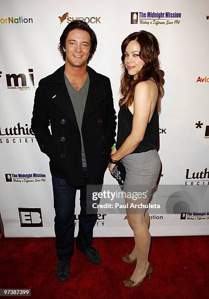 Actors Michael Welch & Joanna Garcia arrive at the "Everything Burns In Hollywood" Red Carpet Charity Drive at The Roxy Theatre on March 2, 2010 in...