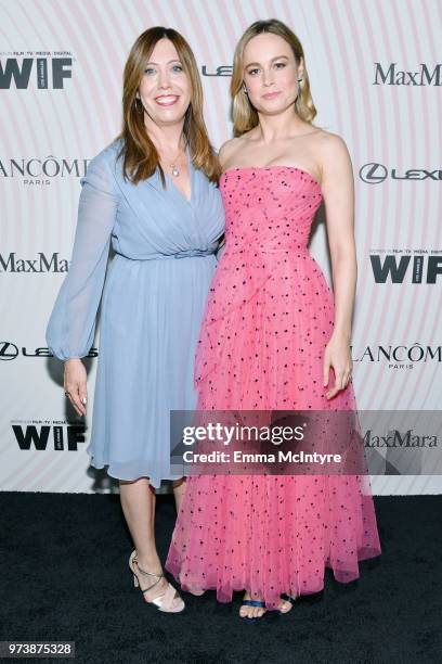 Executive Director of Women In Film, Los Angeles Kirsten Schaffer , wearing Max Mara, and Brie Larson attend the Women In Film 2018 Crystal + Lucy...