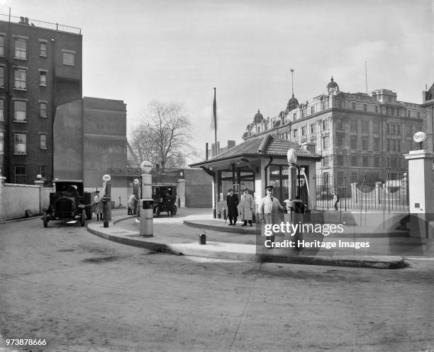 Anglo-American Oil Company petrol station, Euston Road, London, 1922. The company was founded in 1888, importing lamp oil and later motor spirit from...