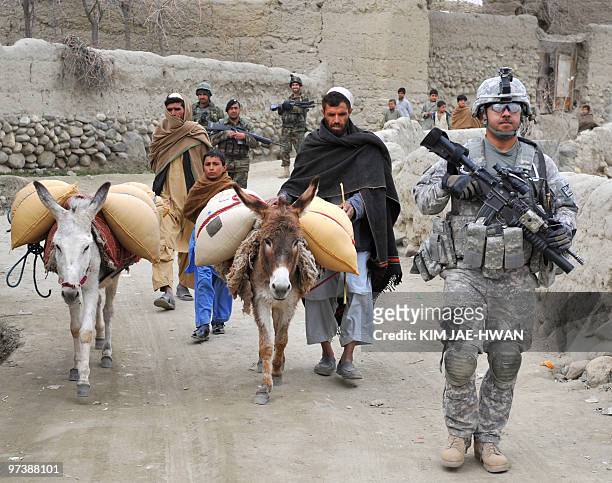 Afghanistan-unrest-US-military,FOCUS by Ben Sheppard This photo taken on February 22, 2010 shows a US 4th Infantry Division, 4th Infantry Brigade...