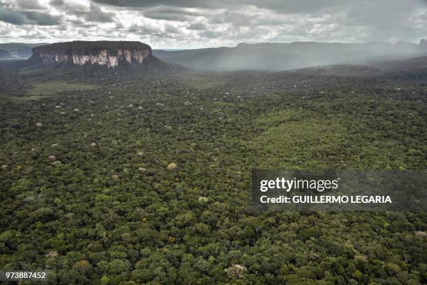 Aerial view of the Serrania de Chiribiquete, located in the Amazonian jungle departments of Caqueta and Guaviare, Colombia, on June 7, 2018. - The 2...