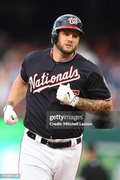 Matt Adams of the Washington Nationals rounds the bases after hitting a home run during a baseball game against the Tampa Bay Rays at Nationals Park...