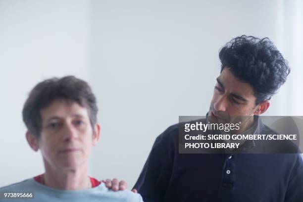physiotherapy consultation - sigrid gombert stock pictures, royalty-free photos & images