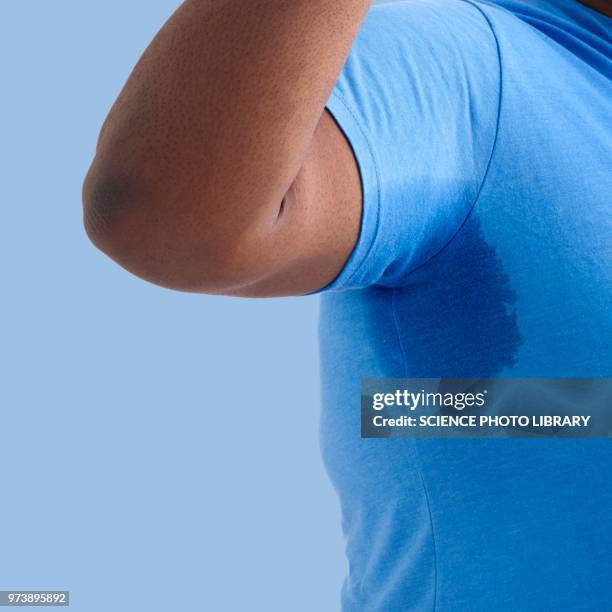 overweight man with sweat patch - body odour stock pictures, royalty-free photos & images
