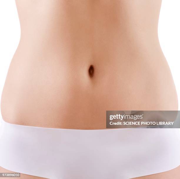 woman's abdomen - belly button stock pictures, royalty-free photos & images