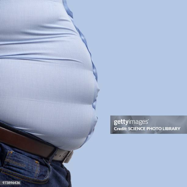 overweight man wearing blue shirt - male belly button stock pictures, royalty-free photos & images