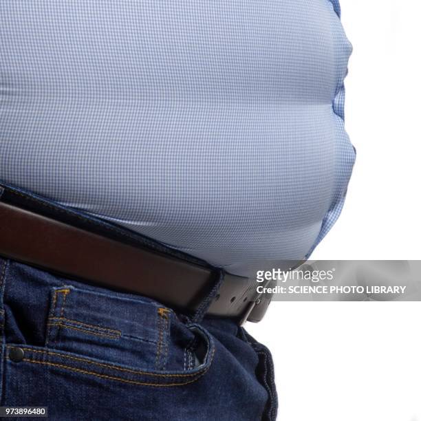overweight man wearing blue shirt - male belly button stock pictures, royalty-free photos & images