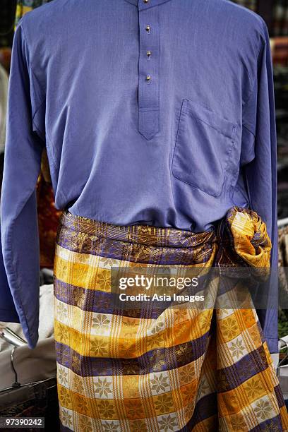 closeup of baju melayu, traditional malay attire for men. - baju melayu stock pictures, royalty-free photos & images