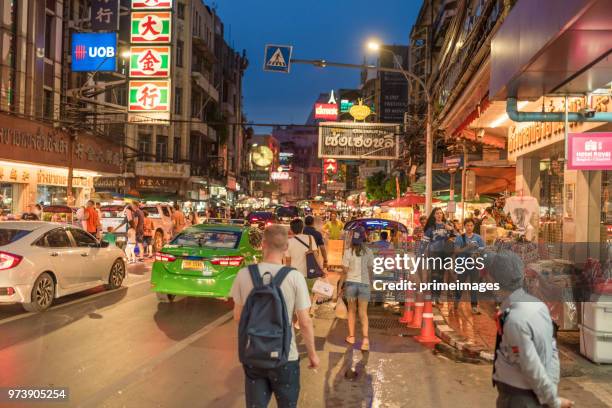 china town yaowarat street in bangkok thailand and traveller enjoy traviling (ed) - traffic jam during chinese new year holiday stock pictures, royalty-free photos & images