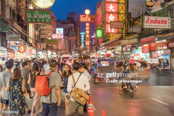 china town yaowarat street in bangkok thailand and traveller enjoy traviling (ed) - traffic jam during chinese new year holiday stock pictures, royalty-free photos & images