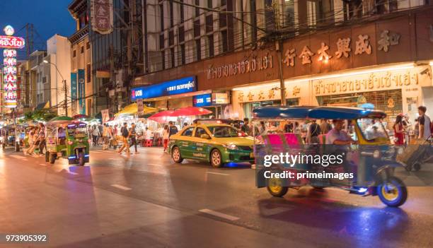 china town yaowarat street in bangkok thailand and traveller enjoy traviling (ed) - traffic jam during chinese new year holiday stock pictures, royalty-free photos & images