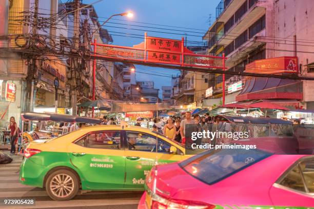 china town yaowarat street in bangkok thailand and traveller enjoy traviling (ed) - traffic jam during chinese new year holiday stock pictures, royalty-free photos & images