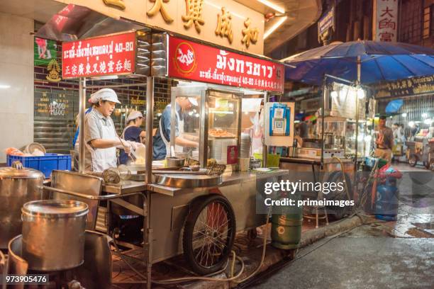 china town yaowarat street in bangkok thailand and traveller enjoy traviling (ed) - traffic jam during chinese new year holiday stock pictures, royalty-free photos & images