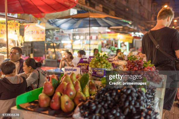 china town yaowarat street in bangkok thailand and traveller enjoy traviling (ed) - traffic jam during chinese new year holiday stock pictures, royalty-free photos & images