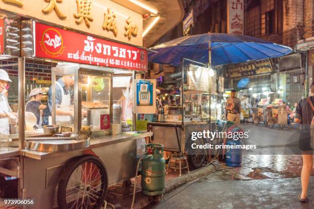 china town yaowarat street in bangkok thailand and traveller enjoy traviling (ed) - traffic jam during chinese new year holiday stock pictures, royalty-free photos & images