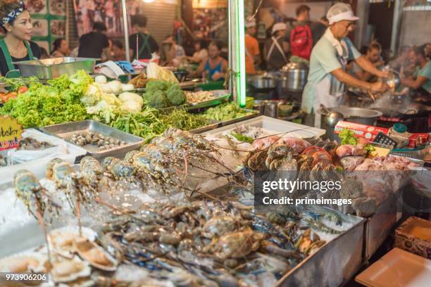 china town yaowarat street in bangkok thailand and traveller enjoy traviling (ed) - traffic jam during chinese new year holiday stock pictures, royalty-free photos & images