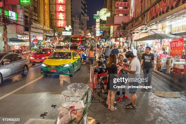 china town yaowarat street in bangkok thailand and traveller enjoy traviling (ed) - traffic jam during chinese new year holiday stock pictures, royalty-free photos & images