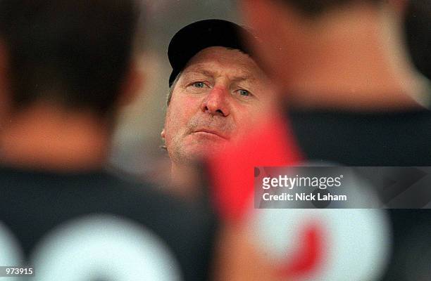 Kevin Sheedy coach of the Essendon Bombers talks to his players during the AFL trial match between the Sydney Swans and the Essendon Bombers at North...