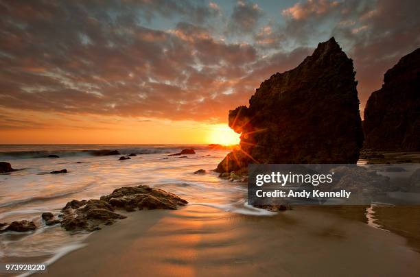 sandy beach at sunset, malibu, california, usa - california beach fotografías e imágenes de stock