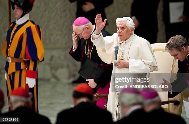 Pope Benedict XVI blesses the faithful gathered in Aula Paolo VI at the Vatican during his weekly general audience on March 3, 2010 . Pope Benedict...