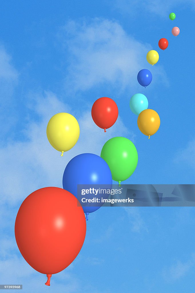 View of balloons against sky, low angle view (digital composite)