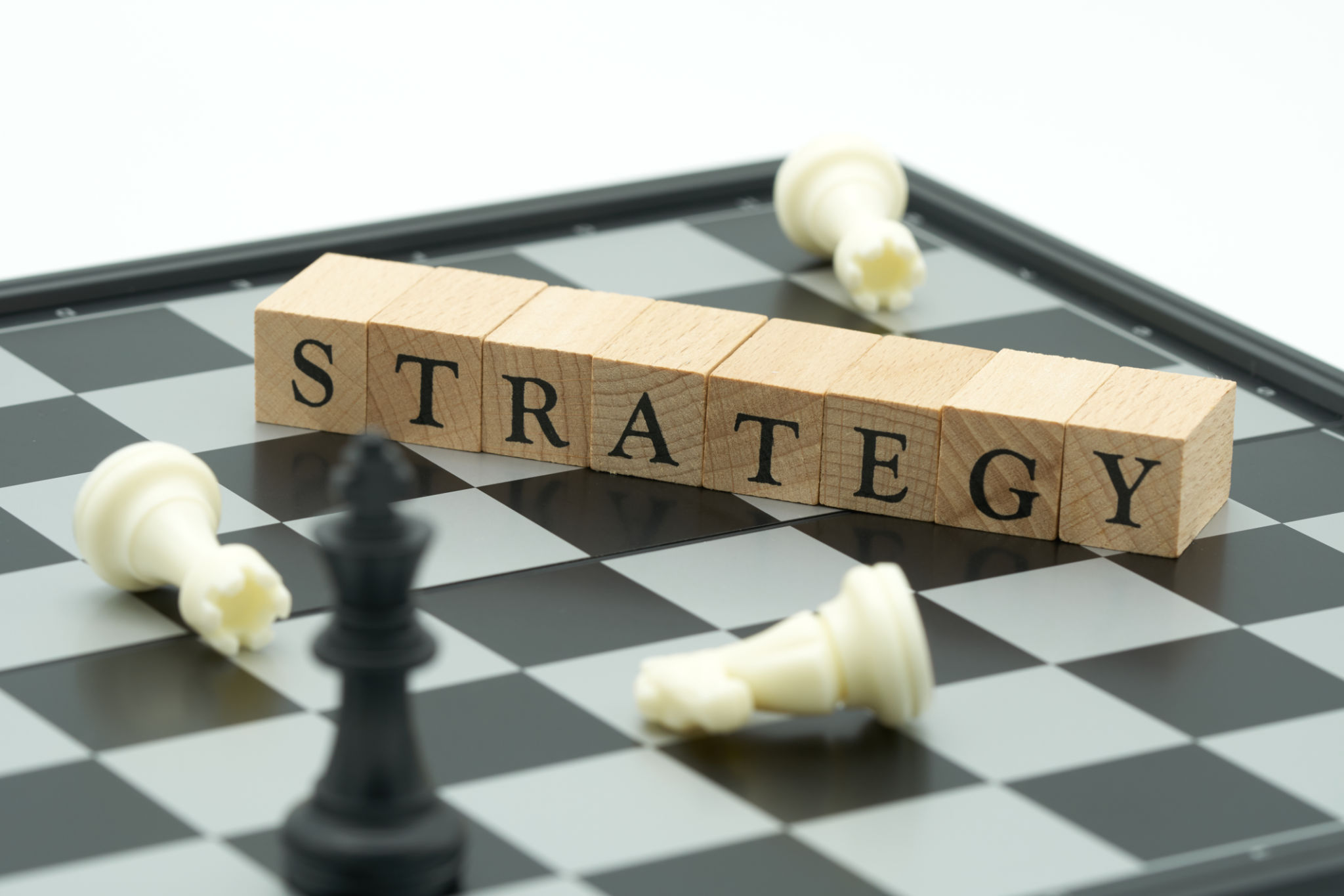 wood word placed on chessboard with a chess piece on the back Negotiating in business. as background business concept and strategy concept with copy space. wood word placed on chessboard with a chess piece on the back Negotiating in business. as background business concept and strategy concept with copy space.