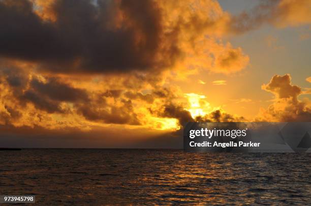 sunset on kailua beach - kailua beach stock pictures, royalty-free photos & images