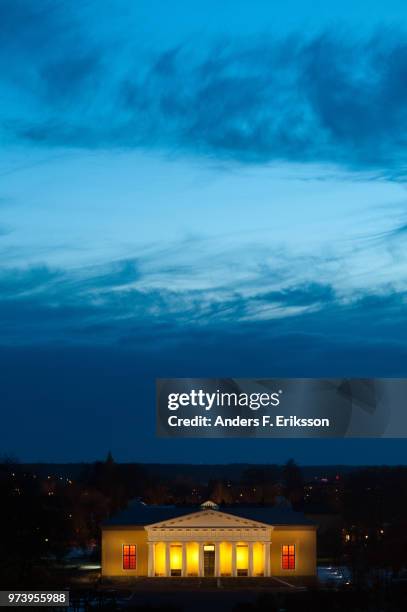 facade of botanical garden building at night, uppsala, sweden - ウップランド ストックフォトと画像