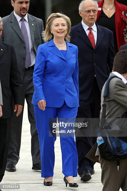 Secretary of State Hillary Clinton leaves after meeting with Brazilian Senate President Jose Sarney at the National Congress in Brasilia, on March 3,...