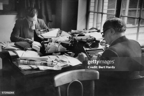 News Of The World crime reporter Norman Rae at the paper's offices in London, April 1953. Original publication: Picture Post - 6488 - The 'News Of...