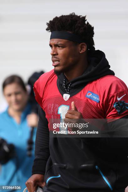 Cam Newton as he walks onto the field during the Carolina Panthers minicamp on June 13 at the Carolina Panthers practice facility in Charlotte, N.C.